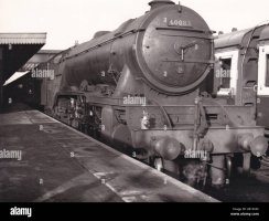 vintage-black-and-white-photo-of-steam-locomotive-train-a3-4-6-2-60083-sir-hugo-at-grantham-st...jpg