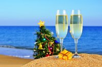 holiday-new-year-sea-ocean-christmas-beach-sand-wine-glasses-christmas-tree-christmas.jpg