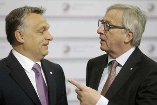 European-Commission-President-Juncker-speaks-to-Hungary-s-Prime-Minister-Orban-b.jpg