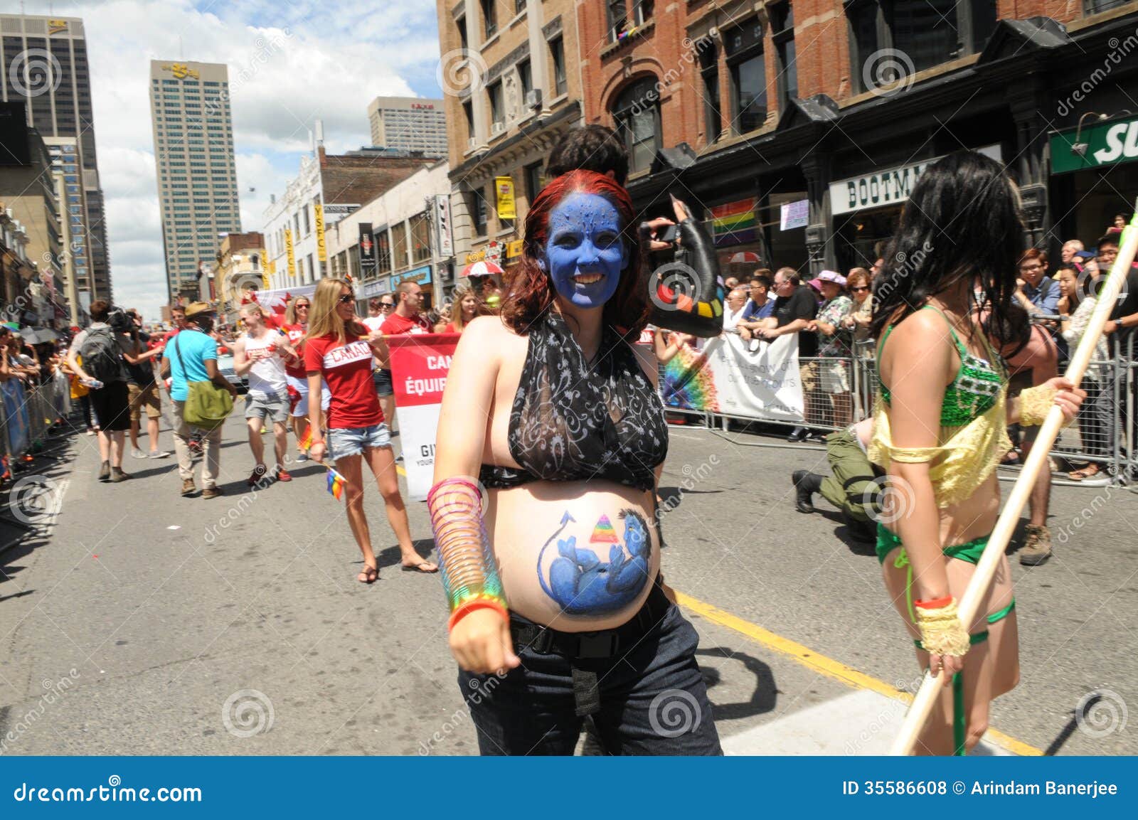 pride-toronto-june-activist-painting-her-would-be-child-her-belly-parade-june-toronto-canada-35586608.jpg
